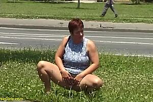 Red hair beauty, voluptuous MILF pees in public
