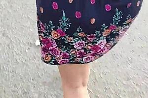I follow and lift the skirt of a woman on the street
