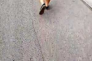 I follow and lift the skirt of a woman on the street