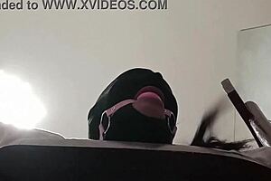 Blindfolded milf in latex, ballgagged, takes deep pulls