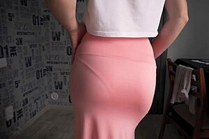 The allure of a visible panty line through a long maxi skirt