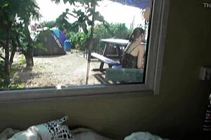 Hairy MILF is getting her asshole eaten in front of the window