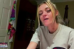 Blonde MILF rubs cock, fingers her shaved pussy