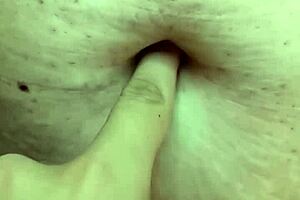 exploring a milf's belly during a relaxing massage session.