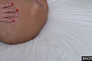 A fat white woman is being fucked by a black guy with a huge dick