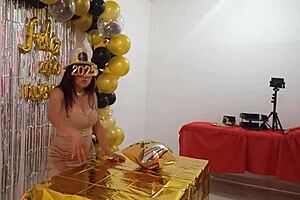 The beautiful lady hosting a stunning New Year's party