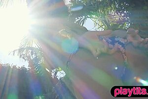 Big ass Asian MILF flaunts juicy boobs and hairy pussy outside