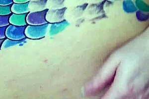 Fucking herself with a dildo, using her husband's cum