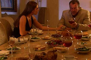 Brunette milf gets fucked hard in living room