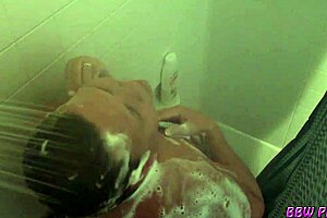 Naughty BBW housewife strips naked for steamy bath fun 😜