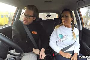 Busty mom fucks with a young man in the car on the photo