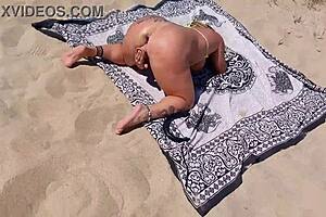 A sexy girl was fucked on the beach by a beater