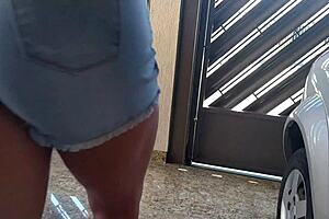 My hot Brazilian neighbor in tiny jeans shorts teases everyone around. I can’t resist watching her flash that ass.