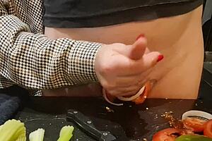 Housewife Cooks Up a Steamy Kitchen Surprise for Husband