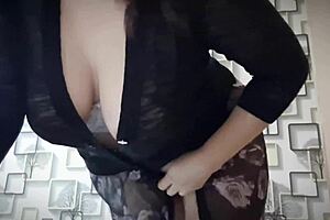 An Asian girl with big natural tits indulges passionately