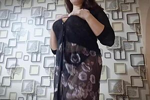 An Asian girl with big natural tits indulges passionately
