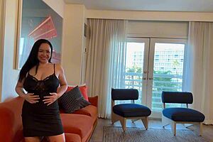 This Asian MILF’s huge tits thrill us