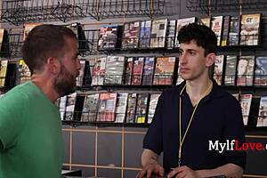 French amateur in black lace bodysuit, red satin dress, stockings, and heels engages in clothed sex with roommate.