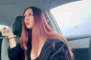 italian milf artemisia love smokes a cigarette in the car, flashing her big tits and nipple.