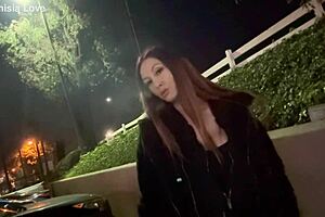 Artemisia Love smoking outdoors.