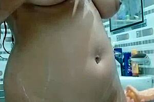 pakistani stepmom in bathroom, what are you up to with that dildo?