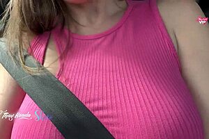 A naughty couple indulges in outdoor sex on the street beside their car