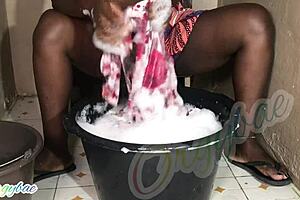 Housewife Does Weekend Laundry in Shaved Pussy