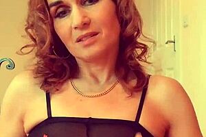 Stunning British milf Lilithalgol in bodystocking and heels plays with insertion for a standing climax.