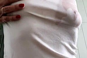 Wanna see baby oil dripping on a wet t-shirt? This babe’s big pussy lips and striptease will blow your mind!