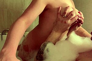 nursing mother pours milk on face