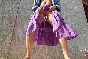 Kinky Mom Plays with Pierced Pussy Outdoors Hard