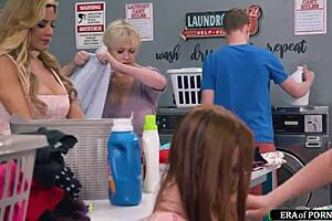 guy fucks busty milfs in a laundry room