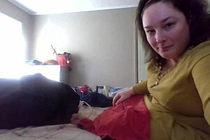 Wife patiently teaches folding clothes at home