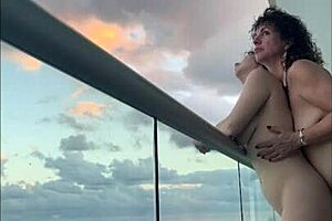 Mexican milf enjoys strap on love in Cancun