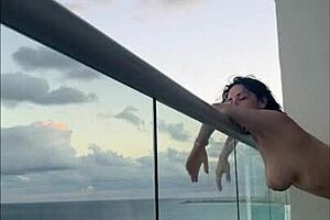 Mexican milf enjoys strap on love in Cancun