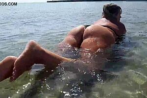 wet big boobs get sucked on toy in public outdoor setting with amateurs