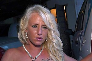 the blonde babe with tattoos sitting on big cock in parking lot, rough and pierced