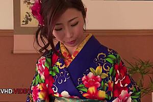 Ayumi Shinoda, a seductive Japanese MILF in kimono, pleasures with fingering, blowjob, and masturbation.