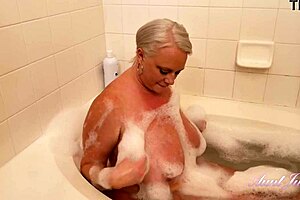 busty hairy milf bathes and touches herself