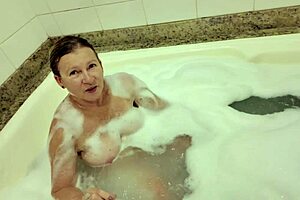 Blonde Milf of 58 Years Fucked Hard in Foamy Hot Tub