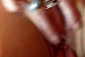 British wife reaches orgasm through solo masturbation, her piercing glistening.