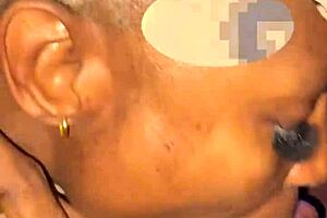 The milf eagerly fills her mouth with big black cock