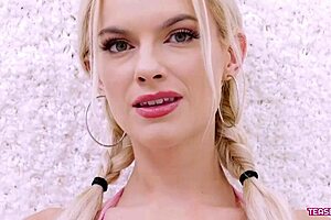 Radiant blonde girl showcases her body