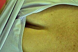 Teasing fat mature wife shows off big boobs and juicy curves.