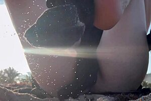 Italian milf with big tits wears sexy bikini at Florida public beach, flashing juicy shaved pussy and soles