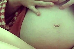 Pregnant milf masturbates with natural tits, contrasting her solo pleasure.