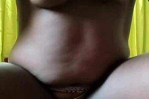 african girl relaxes in her bedroom with personal time