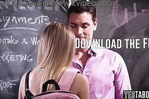 mature teacher interacts with teen student in classroom