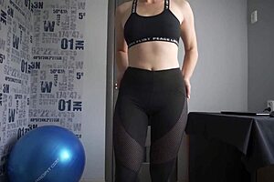 The athletic milf teases visible panty lines in tight leggings