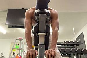 Muscular bodybuilder works biceps for lifting ladies in public California sex